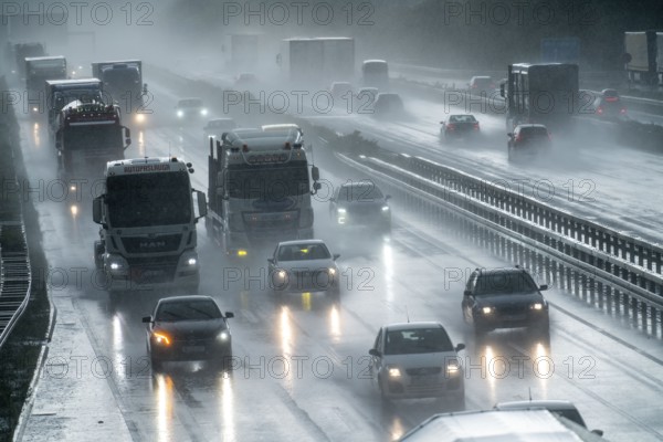 A2 motorway, at Recklinghausen motorway junction, heavy traffic during a thunderstorm, North Rhine-Westphalia, Germany, Europe