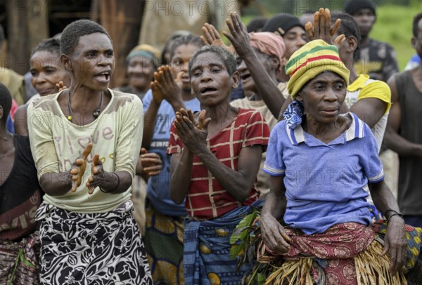 Pygmy woman of the BaAka people dancing and singing, Libongo, Est region, Cameroon, Africa