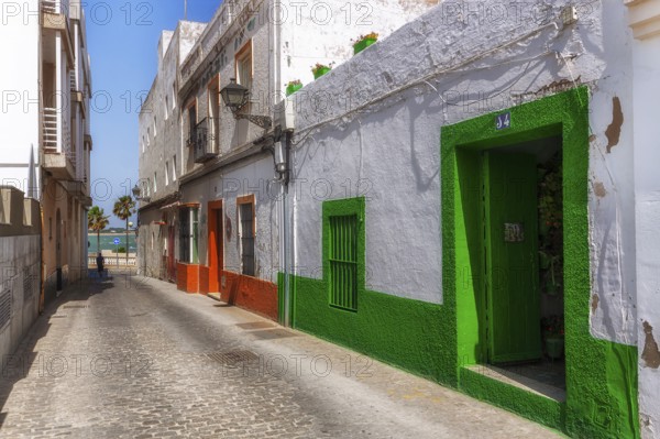 Small alley with colourful house facades, Rota, Andalusia, Spain, Europe