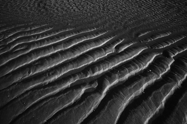 Sand ripples, wavy lines in the sand, structure, sandy beach, Meia Praia beach, Lagos, Atlantic Ocean, evening light, black and white, Algarve, Portugal, Europe