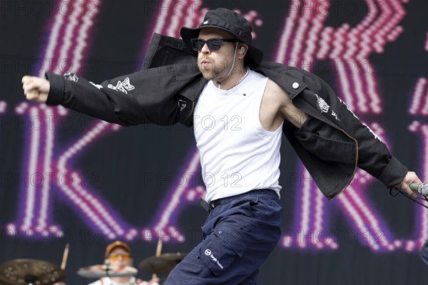 Adenau, Germany, 7 June 2024: Enter Shikari (Roughton Rou Reynolds, singer) play at Rock am Ring. The festival takes place at the Nürburgring race track near the town of Adenau from 7 to 9 June 2024, Europe