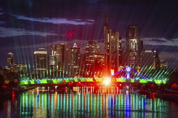 On Wednesday, 12 June 2024, the city of Frankfurt am Main will celebrate the start of the European Football Championship with a spectacular light show from 22:30. The eastern side of the Flößerbrücke bridge will be transformed into a spectacular spectacle of light and colour in the colours of the 24 participating nations, Frankfurt am Main, Hesse, Germany, Europe