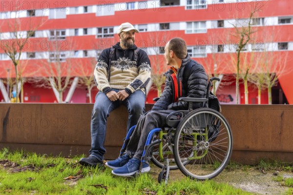 Two male friends, one with a disability, enjoy a conversation outdoors in an urban setting