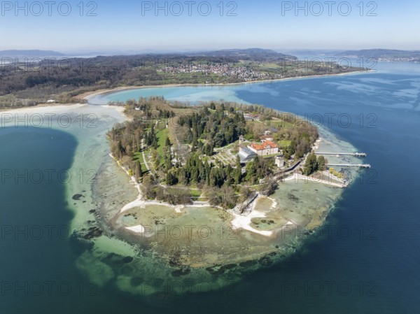 Aerial view of the island of Mainau at low tide with spring-like vegetation, on the horizon the village of Litzelstetten and the Bodanrück, district of Constance, Baden-Württemberg, Germany, Europe
