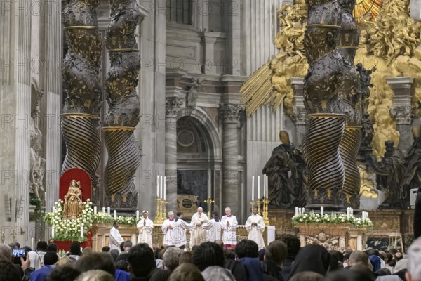 Saint Father Pope Francis prays in St Peter's Basilica under Bernini's canopy, holds Saint Mass in front of the faithful, Vatican City, Vatican, Rome, Italy, Europe