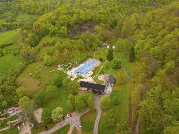Waldfreibad Eningen unter Achalm, leisure centre with swimming pool surrounded by forest and nature, Eningen, Swabian Alb, Germany, Europe