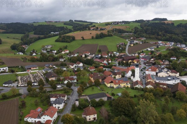 Drone shot, view of village with church, Enzenkirchen, Innviertel, Upper Austria, Austria, Europe
