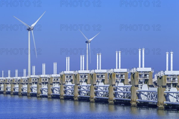 Movable barrier sections of the storm flood barrier, Oosterscheldekering, Eastern Scheldt storm surge barrier at Neeltje Jans, Zeeland, Netherlands