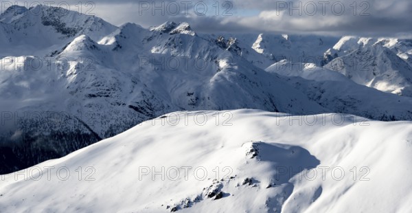 Snow-covered Alps, winter landscape in the mountains, Albula Alps, Grisons, Switzerland, Europe