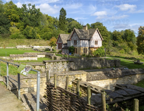 Overview of excavated walls and museum building, Chedworth Roman Villa, Chedworth, Cotswolds, Gloucestershire, England, UK