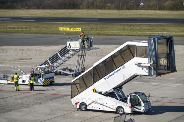 Dortmund Airport, DTM, apron, in front of the terminal, runway, mobile passenger stairs waiting for the next flight, North Rhine-Westphalia, Germany, Europe
