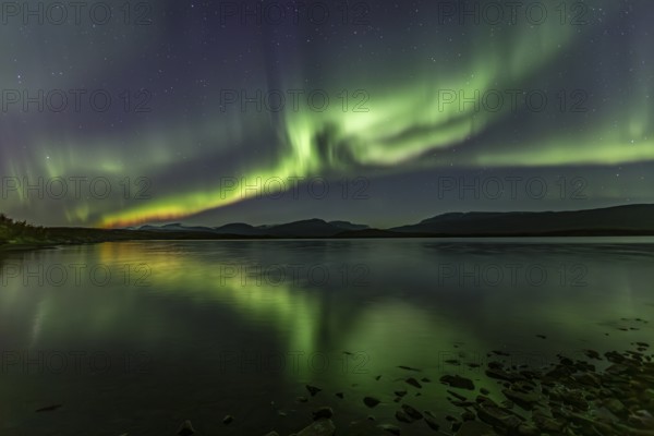 Northern lights, aurora borealis, reflection, lake, mountains, twilight, autumn, Torneträsk, Laponia, Lapland, Sweden, Europe