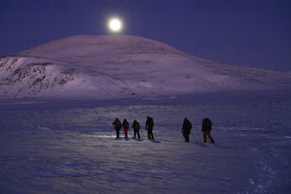 Early morning snowshoe hike with a full moon, Dovrefjell-Sunndalsfjella National Park
