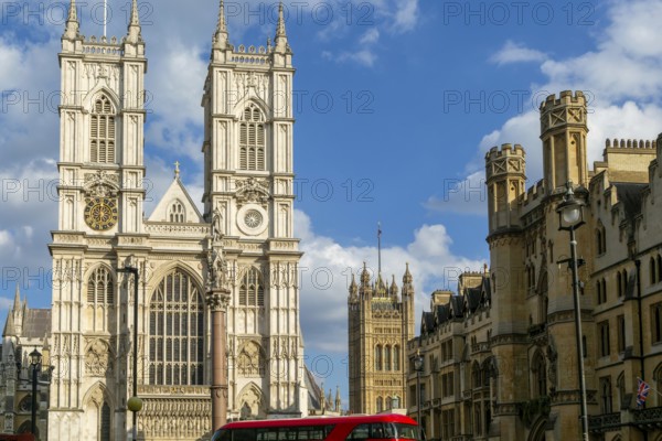 Towers and frontage of Westminster abbey church with Victoria Tower in background, Westminster, London, England, UK