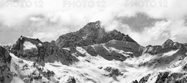 View at the summit of Piz Laviner, mountain panorama in winter, mountain landscape with mountain peak Piz Julier, black and white, Bündner Haute Route, Albula Alps, Rhaetian Alps, Grisons, Eastern Switzerland, Switzerland, Europe