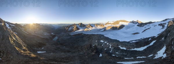 Atmospheric sunrise in a picturesque mountain landscape, alpenglow, aerial view, at the summit Becher with glacier Übeltalferner, Stubai Alps, South Tyrol, Italy, Europe