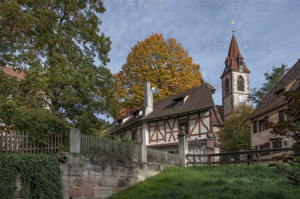 Detail of the Haller castle, already mentioned around 1200, behind the church of St Nicholas and St Peter, on the right the vicarage, Kirchenberg 11 and 13, Nuremberg-Mögeldorf, Middle Franconia, Bavaria, Germany, Europe