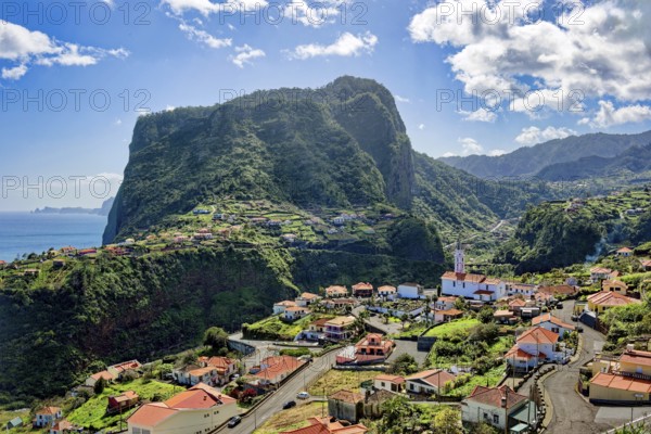 The village of Faial with a view of the landmark Eagle Rock from the Miradouro do Fortim viewpoint, Madeira, Portugal, Europe