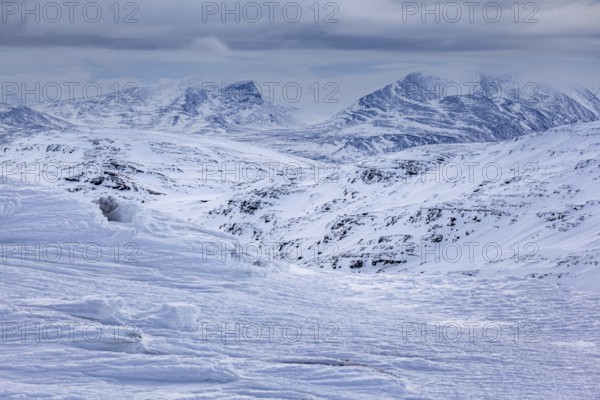Winter mountain landscape, snow, snow drifts, cloudy, Lapporten, Laponia, Lapland, Sweden, Europe