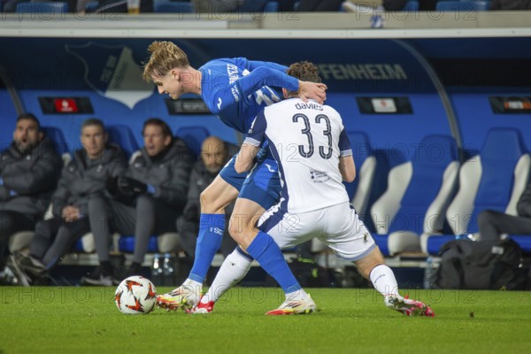 Football UEFA Europa League, 2024/25 season, matchday 7: TSG Hoffenheim v Tottenham Hotspur. Picture: Duel between Max Moerstedt (33, Hoffenheim) and Ben Davies (33, Tottenham)