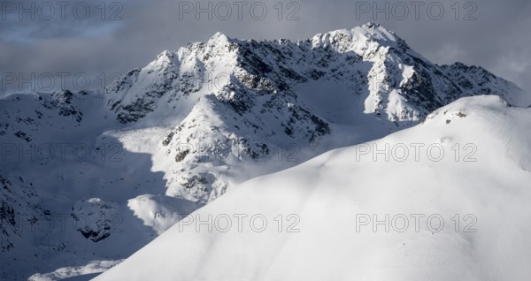 Snow-covered Alps, winter landscape in the mountains, Albula Alps, Grisons, Switzerland, Europe