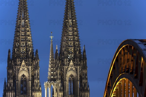 Cologne Cathedral and the Hohenzollern Bridge illuminated with LED lights, Cologne, North Rhine-Westphalia, Germany, Europe
