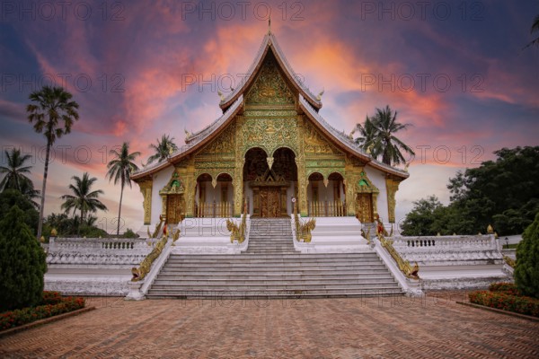 Lovely sunset at a lovely temple in Luang Prabang in summer, Laos, Asia