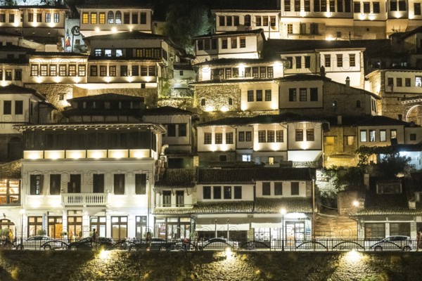 Detail of houses in the illuminated historic town of Berat in Albania, UNESCO, the city of a thousand windows