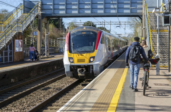 British Rail Class 720 Bombardier Aventra Electric Multiple Unit passenger train at Marks Tey railway station, Essex, England, UK