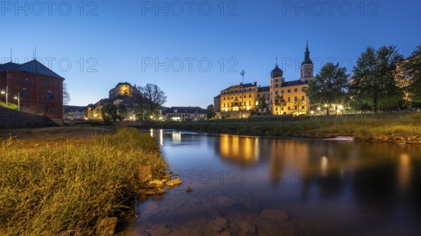 Town view with Upper Castle, Lower Castle and St Mary's Church on the River White Elster at dusk, Greiz, Thuringia, Germany, Europe