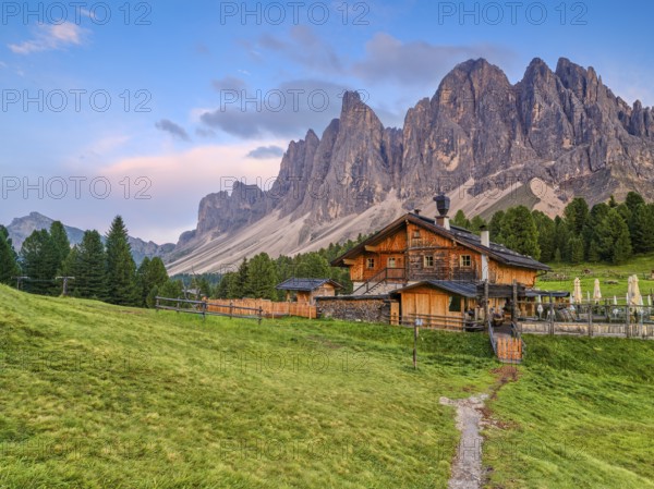 Geisleralm with Geisler group and alpenglow, Dolomites, Santa Magdalena, South Tyrol, Italy, Europe