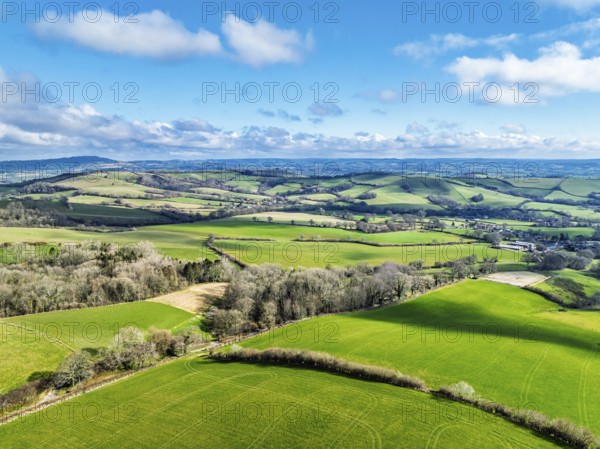 Farms over Road A35 from a drone, Morcombelake Village, Bridport, Dorset, England, United Kingdom, Europe
