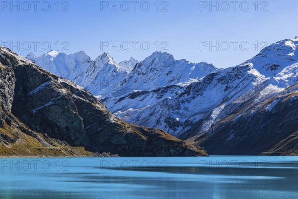 Moiry reservoir, snow-covered mountain peaks behind, near Grimentz, Val d'Anniviers, Valais Alps, Canton Valais, Switzerland, Europe