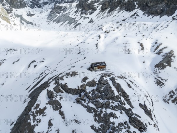 Aerial view, winter in the mountains, Chamanna Jenatsch CAS, Swiss Alpine Club hut, Val Beve, Grisons, Switzerland, Europe