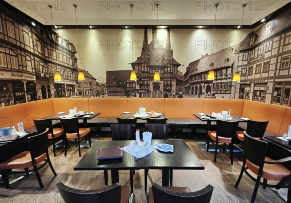 Interior photo of cafe with photo wallpaper of the market square with the town hall, old town, Wernigerode, Harz, Saxony-Anhalt, Germany, Europe