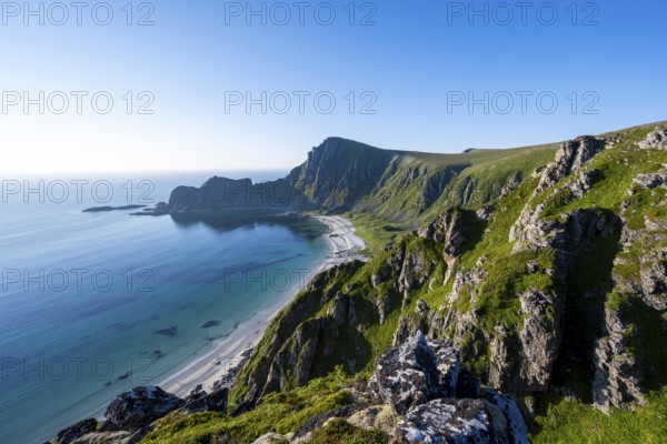 View of coastal landscape, cliffs with peak Måtind or Måtinden, Høyvika beach and sea, hike to the peak of Måtind, Andøya island, Vesterålen, Nordland, Norway, Europe