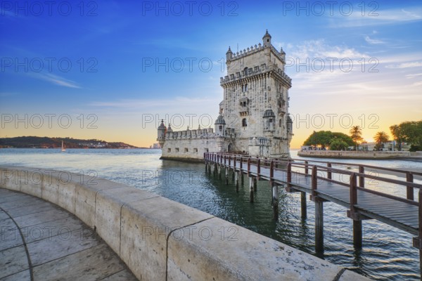 Belem Tower or Tower of St Vincent, famous tourist landmark of Lisboa and tourism attraction, on the bank of the Tagus River (Tejo) on sunset. Lisbon, Portugal, Europe