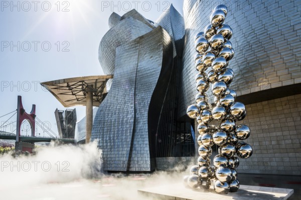 Guggenheim Museum Bilbao, architect Frank O. Gehry, sculpture Tall Tree and the Eye by Anish Kapoor, Bilbao, Basque Country, Spain, Europe
