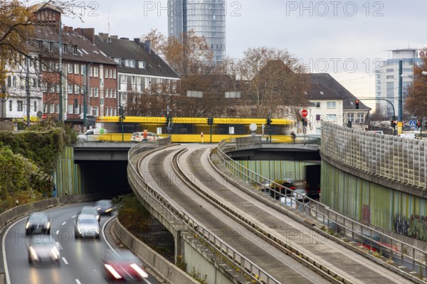 Motorway A40, Ruhrschnellweg, skyline of the city centre of Essen, exit Essen-Huttrop, track bus route, this area would also be affected by a diesel driving ban, Essen, North Rhine-Westphalia, Germany, Europe
