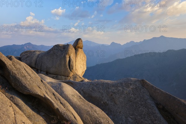 View of stones and rock formations from Ulsanbawi rock peak on sunset. Seoraksan National Park, South Corea