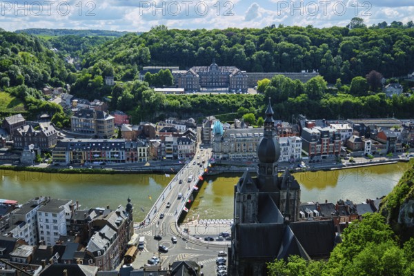 Aerial view of Dinant town, Collegiate Church of Notre Dame de Dinant, River Meuse and Pont Charles de Gaulle bridge from Dinant Citadel. Dinant, Belgium, Europe