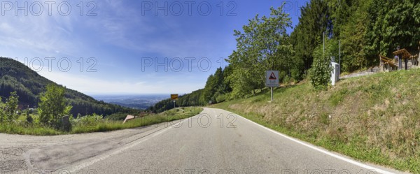 Country road through the Black Forest with view towards the Upper Rhine Graben near Sasbachwalden, Ortenaukreis, Baden-Württemberg, Germany, Europe