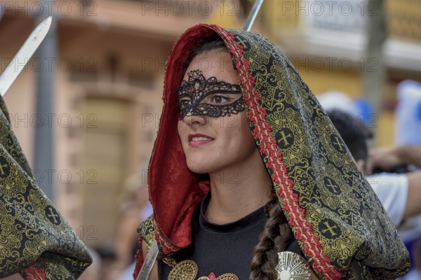 Woman in historic clothes, Moors and Christian Parade, Moros y Cristianos, Jijona or Xixona, Province of Alicante, Costa Blanca, Spain, Europe