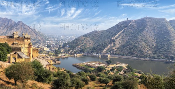 Indian travel famous tourist landmark, panorama view of Amer (Amber) fort and Maota lake, Rajasthan, India, Asia
