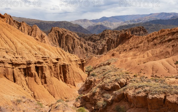 Eroded mountain landscape with sandstone cliffs, canyon with red and orange rock formations, Konorchek Canyon, Chuy, Kyrgyzstan, Asia