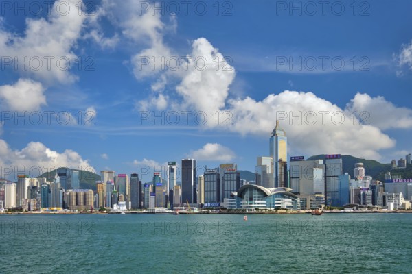 HONG KONG, CHINA, MAY 1, 2018: Hong Kong skyline cityscape downtown skyscrapers over Victoria Harbour on sunset. Hong Kong, China, Asia