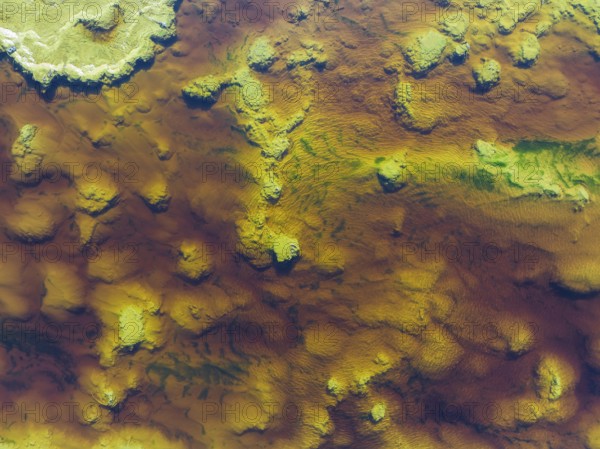 Detail of the Rio Tinto (Red river) with its reddish hue due to oxidised iron minerals and other mineral-rich deposits in its water, aerial view, drone shot, Huelva province, Andalusia, Spain, Europe