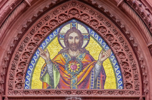 Musical depiction of Jesus Christ in the pointed arch of the main portal of the Church of the Sacred Heart in Freiburg im Breisgau, Baden-Württemberg, Germany, Europe