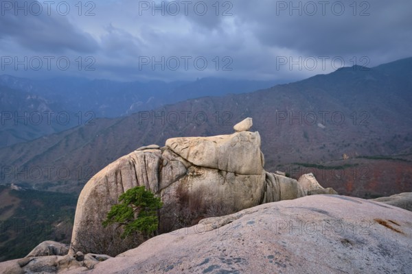View of stone and rock formations from Ulsanbawi rock peak in stormy weather. Seoraksan National Park, South Corea