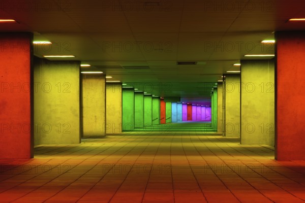 Colorful mulitcolord illuminated gallery tunnel rainbow passage under NAI building, Nederlands Architecture Institute near Museum Park, Rotterdam, The Netherlands, Europe
